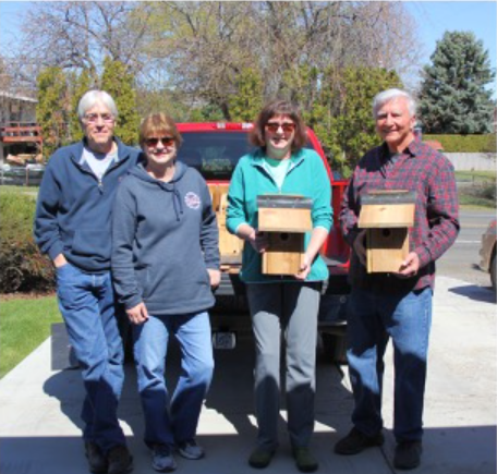 Image - (from left) Mike and Lynne, Karen and Joe showing off the new Bluebird homes